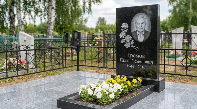 Памятник с гравировкой хризантем — выполненная работа «Громов» в Мурманске
