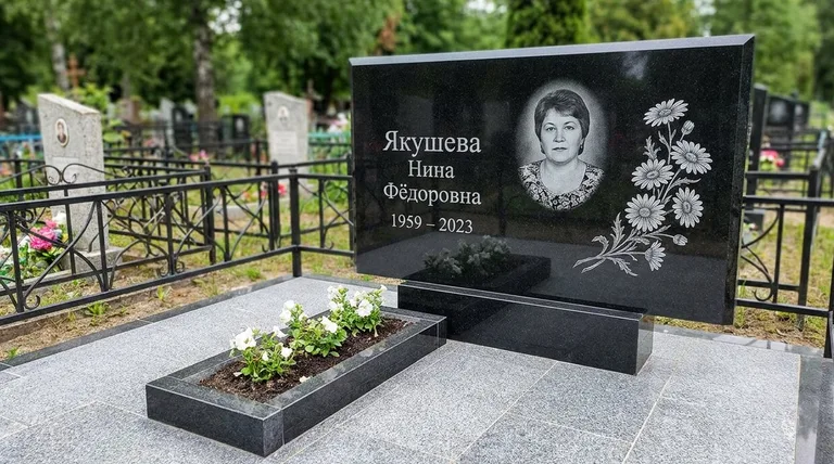 Памятник с гравировкой ромашек — выполненная работа «Якушева» в Мурманске