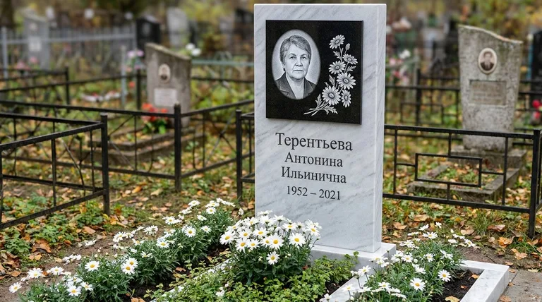Памятник с гравировкой ромашек — выполненная работа «Терентьева» в Мурманске