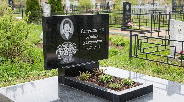Памятник с гравировкой ромашек — выполненная работа «Степанова» в Мурманске