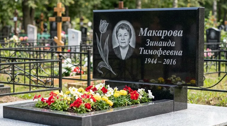Памятник с гравировкой тюльпанов — выполненная работа «Макарова» в Мурманске