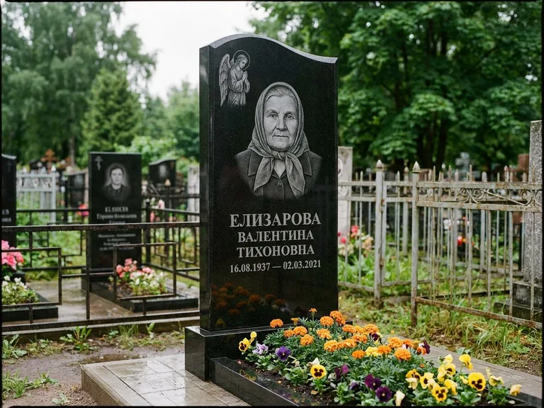 Памятник с гравировкой ангела — гравировка ангела с голубем по диагонали стелы, работа «Пантелеева» в Мурманске